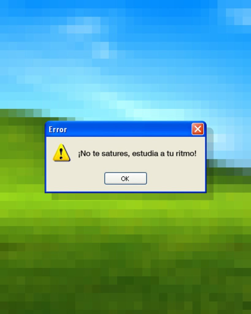 Ventana de error retro de Windows XP con el mensaje «¡No te satures, estudia a tu ritmo!» y un botón OK, sobre el fondo de pantalla «Bliss» pixelado, como una advertencia sobre los peligros de la multitarea al estudiar.